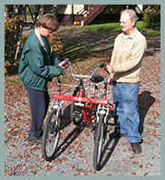 Tetra volunteer and client with Tetra Cycle.